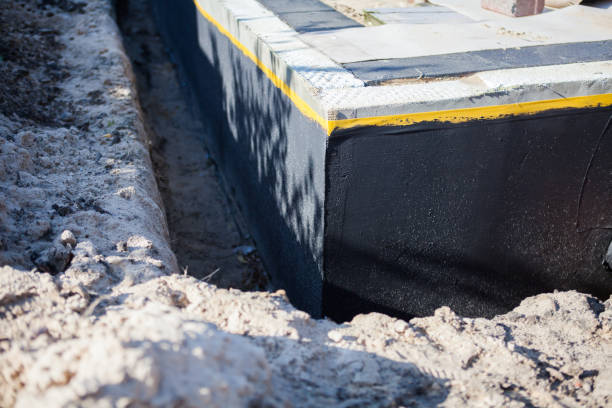 Professional Emergency Waterproofing technician working in Williamsport, OH